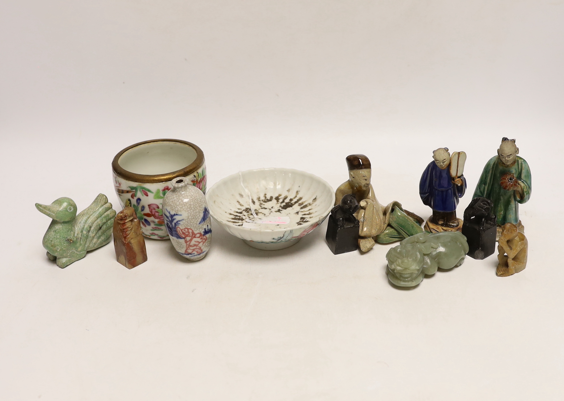 Three Chinese seals, three hardstone carvings and three pottery glazed figures and a 19th century Chinese famille rose pot, crackle glaze snuff bottle and a pedestal dish, 11.5cm